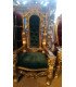 Golden Lion King throne in green velvet.