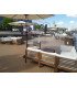 Teak garden furniture with white cushions