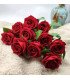 Bouquet of 10 artificial red roses H 50 cm with long stems and green leaves, available for rental from 126 Events