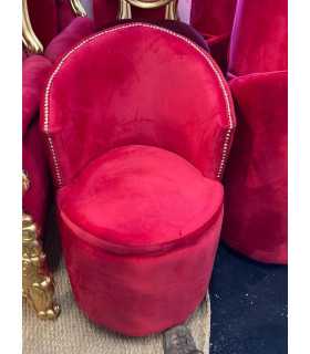 Fireside chair in red velvet with studs