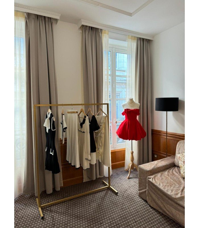 photo of matte gold clothing rack available for rent from 126 Events