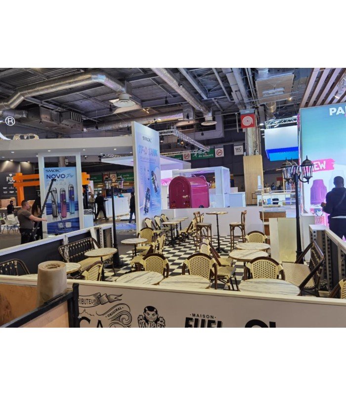 Cast-iron stand-up table with white tray at a seminar rental by 126 events in Paris