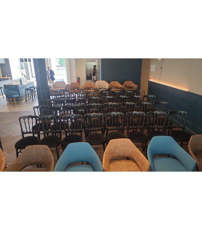 Photo of the black Napoleon III chair at a seminar, chair rented from 126 Events