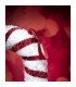 Detail of the string for hanging the candy cane, height 52 cm, on a red background.
