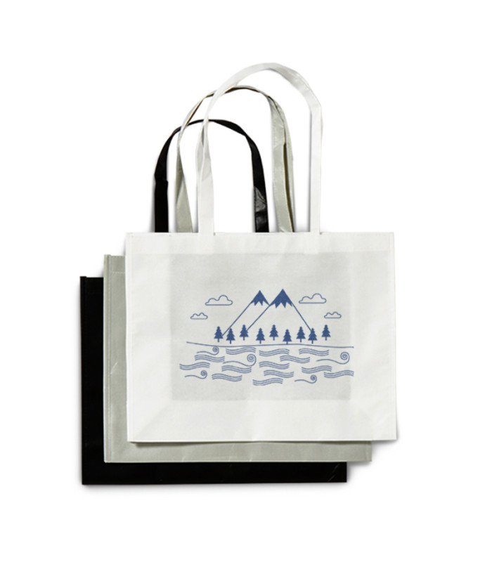 Stack of custom shopping bags, ready to hand out to visitors at a trade fair or trade show in Paris