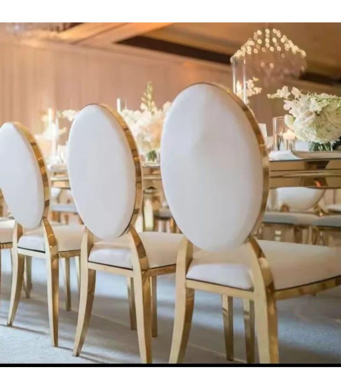 Rental of gold medallion chair with white cushion
