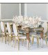 Rental of gold medallion chair with white cushion