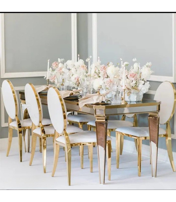 Rental of gold medallion chair with white cushion
