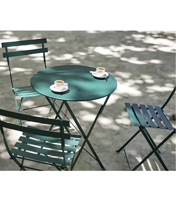 Guéridon en métal vert foncé et salon de jardin