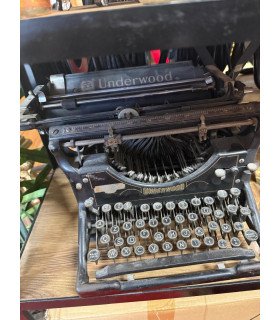 Vintage black typewriter available for rent for vintage decor at 126 Events