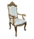 Photo of white and gold faux leather baroque armchair against a white background, available for hire from 126 Events