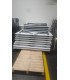 Tables pliantes rectangulaires 180 cm x 80 cm pliées et empilées pour le stockage