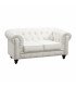 canapé Chesterfield cuir blanc 2 places sur fond blanc