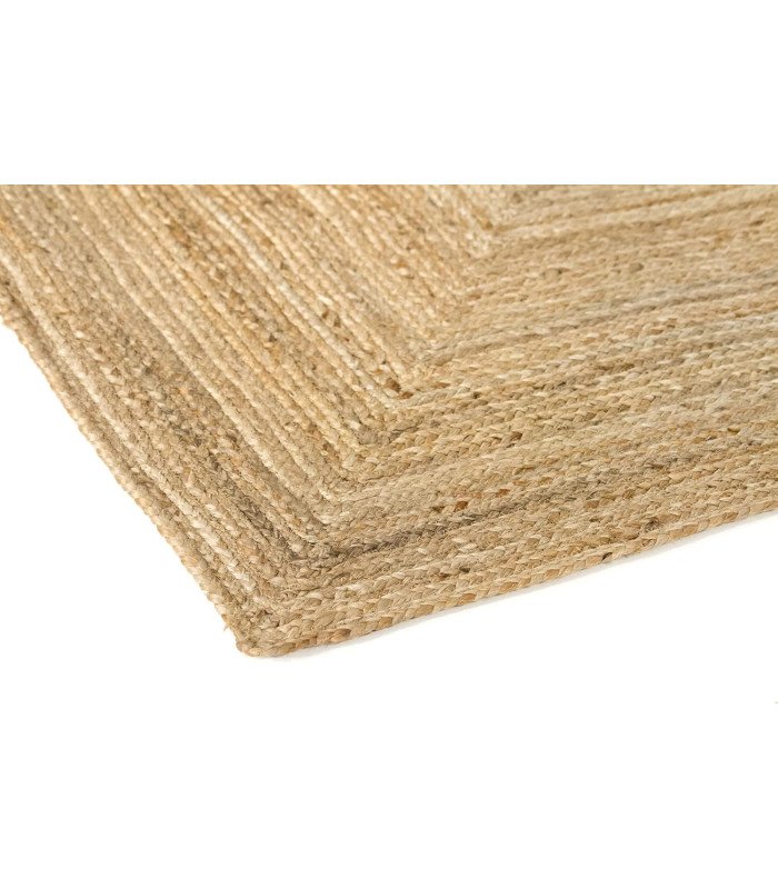 Détail angle tapis rectangulaire en toile de jute 120 x 170 cm montrant la texture de la fibre naturelle