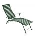Green steel garden lounge chair on a white background