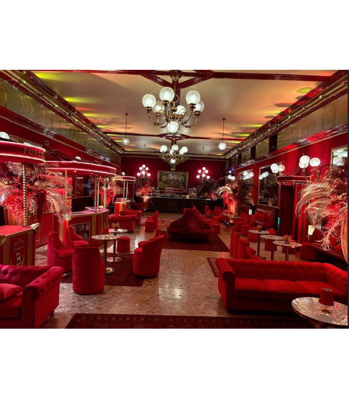 Canapé boudoir capitonné en velours rouge