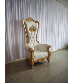 Photo of the gold and white wedding throne for rent by 126 Events