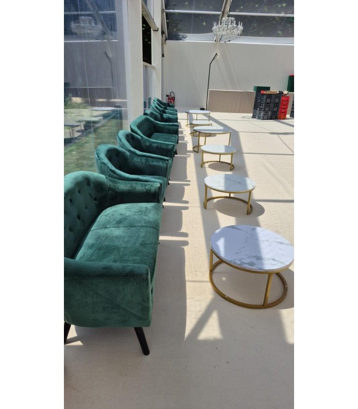 Scandinavian-style nesting coffee table, set up during preparations in an event tent
