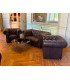 Brown Chesterfield armchair in aged leather