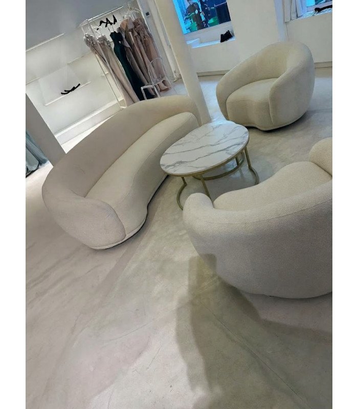 Sofa with rounded back in white bouclé fabric