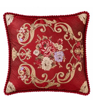 Square red cushion with floral design, gold ornaments and bobble trim, available for event rental from 126 Events