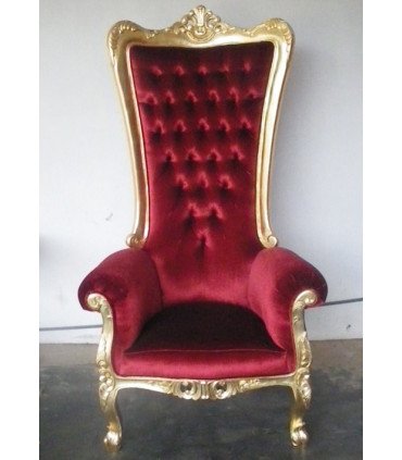 Red and gold Prince wedding throne in red velvet with gilded wooden frame.