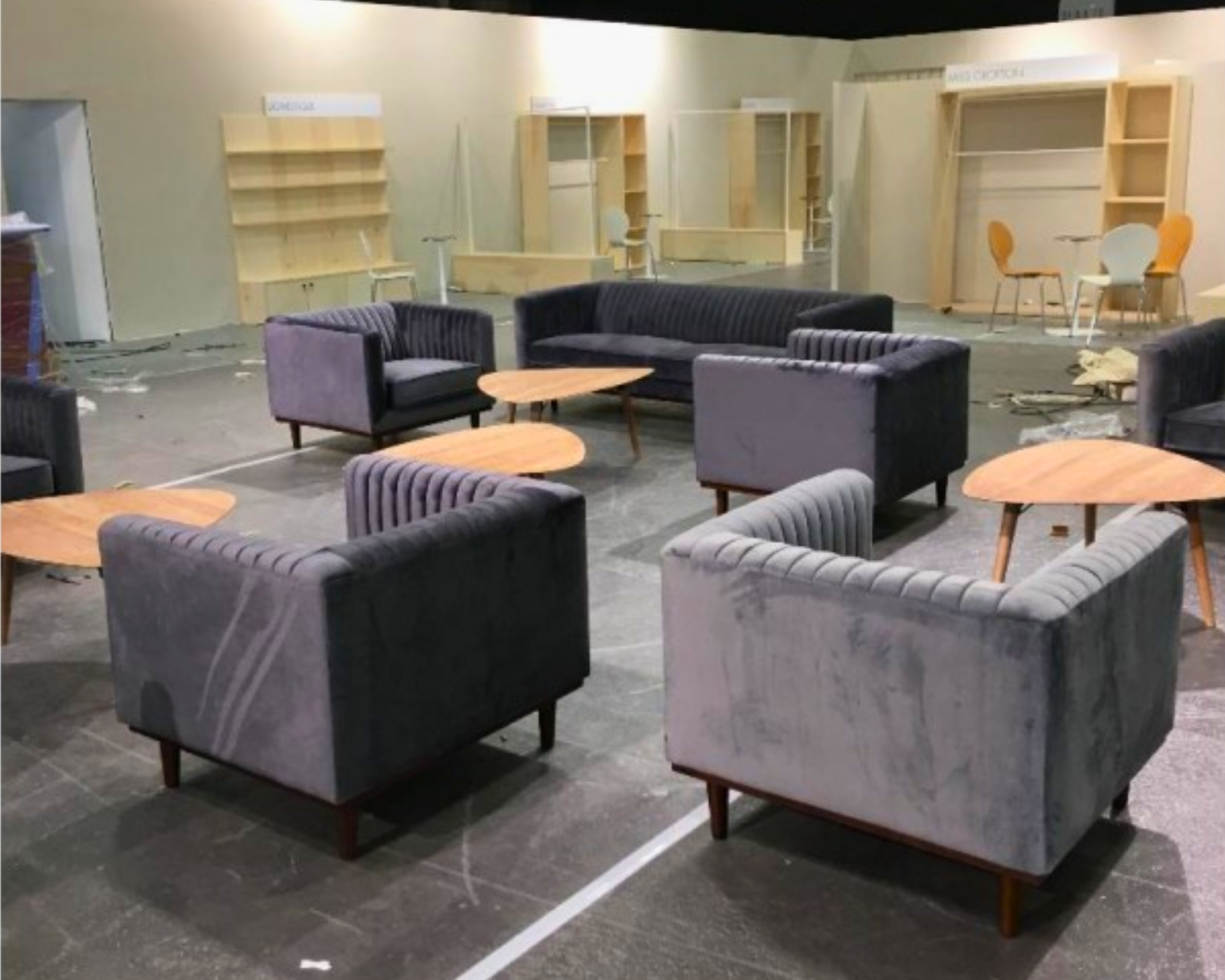 photo with gray sofas, for a trade show, rented by 126 Events